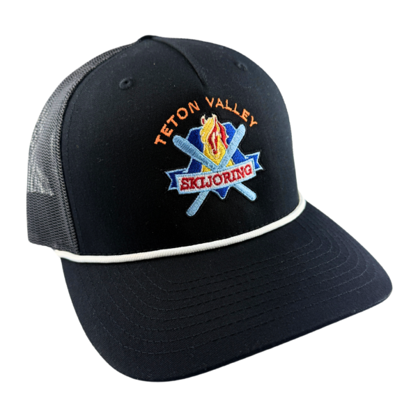 Black trucker hat featuring a white rope along the brim and a full-color Teton Valley Skijoring logo embroidered on the front