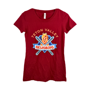 Marron women's-cut short-sleeved t-shirt showing a large vinyl print of the full-color Teton Valley Skijoring logo