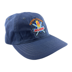 Navy blue dad hat with a full-color Teton Valley Skijoring logo embroidered on the front